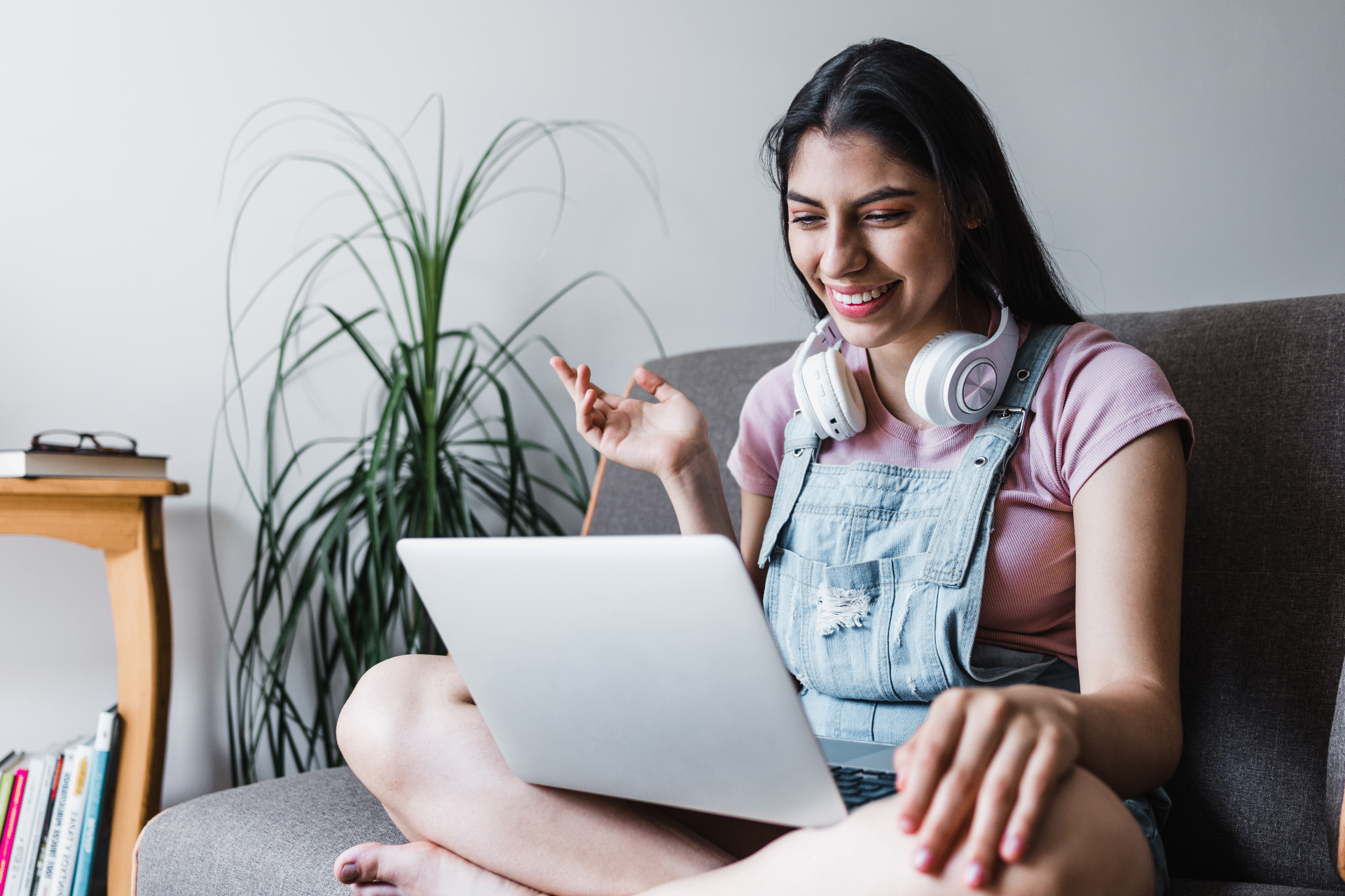 A Tech Navigator smiling while taking part in a live online session.